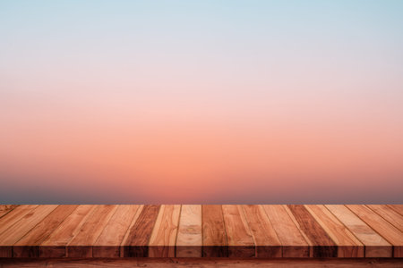 Empty top wood table with abstract gradient sunrise in the sky natural background.