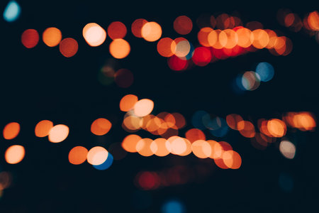 Abstract blur defocused night bokeh light in urban background.