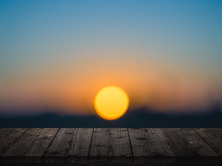 Empty top of old wood with blur sunrise in the morning.の写真素材