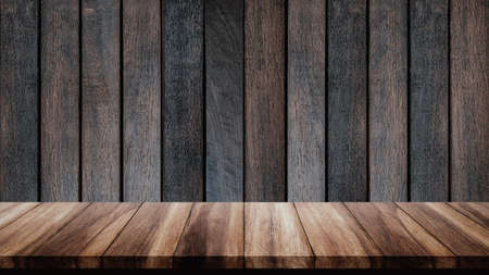 Empty wood table with old wooden wall background. For display or montage your products.の写真素材