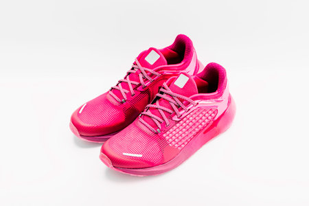 Red sneaker on white background.の写真素材