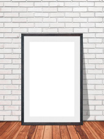 Black blank frame in white brick wall with wooden floor texture interior room background, Mockup template for your content or design.の写真素材