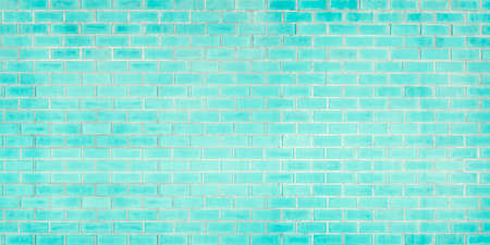 Close-up photo of old blue brick texture detail background. House, shop, cafe and office design backdrop. Paint brickwork wall and copy space.の写真素材
