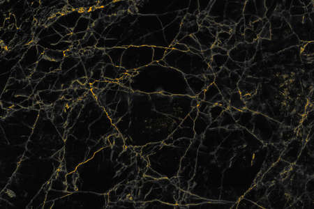 Abstract golden and black marble stone texture for background and wallpaper decorative design.の写真素材