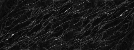 Black marble stone texture for background or luxurious tiles floor and wallpaper decorative design.の写真素材