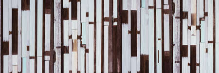 Close-up panorama photos of old wood texture details background. House, shop, cafe and office design backdrop. Paint wooden wall and copy space.の写真素材