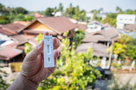 Self test ATK at home. Covid-19 negative test result with SARS CoV-2 Rapid antigen test kit.の写真素材
