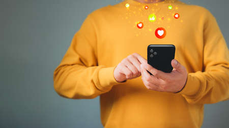 Man hand using smartphone typing live chat chatting on application communication digital web and social network concept. Social media application chat box.の写真素材