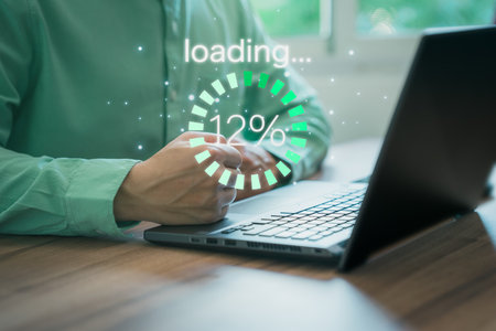 Businessman using a computer laptop to download and waiting to loading digital business data form website, concept of waiting for load of loading bar.の写真素材
