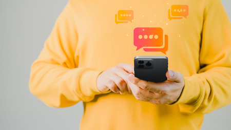 Man hand using smartphone typing live chat chatting on application communication digital web and...