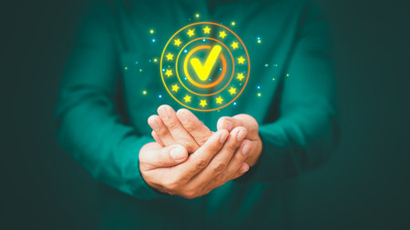 Quality assurance of business services, Businessman holding and showing the best quality assurance with golden five stars. Guarantee, Standards, ISO certification and testimonial concept.の写真素材