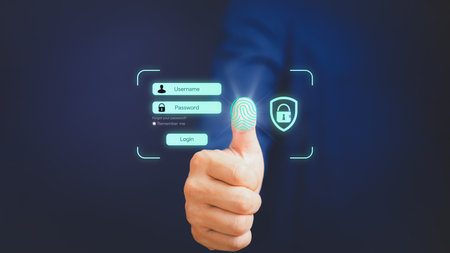 Man login with fingerprint scanning technology. Security concepts and fingerprint password control in the technology of the future.の写真素材