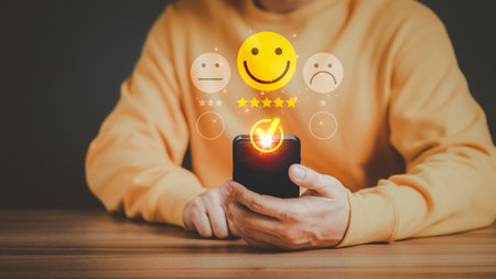 Man using a mobile phone in give rating to service experience on application. Online customer review satisfaction feedback survey and testimonial.の写真素材