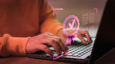 Man working with sign of the top service quality assurance on virtual screen. Guarantee, Standards, ISO certification and standardization concept.の写真素材