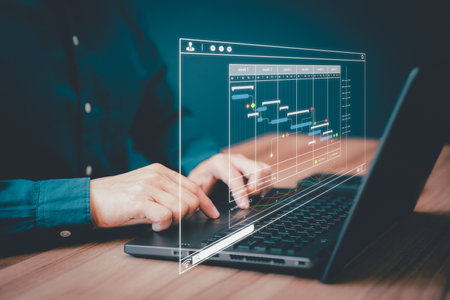 Man working with technology computer in Business Analytics and Data Management System to make report with KPI and metrics connected to database. Corporate strategy for operations, planing, marketing.の写真素材