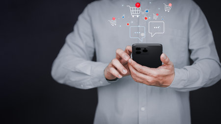 Adult man using a smartphone order in online store, shopping on internet, technology concept of mobile phone app.の写真素材