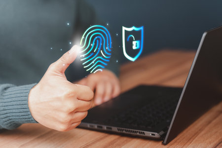 Man login with fingerprint scanning technology. Security concepts and fingerprint password control in the technology of the future.の写真素材