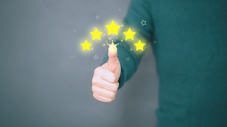 Man give positive reviews for customer satisfaction surveys, Five star rating, Customer assessment feedback, Service rating satisfaction and testimonial concept.の写真素材