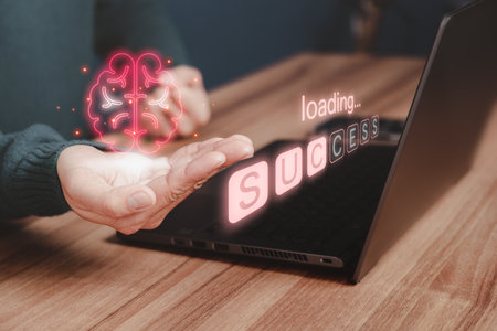 Man holding a abstract brain icon with virtual screen loading bar with success text while working on the computer to think and create new ideas with technological innovations and creativity Ideas.の写真素材