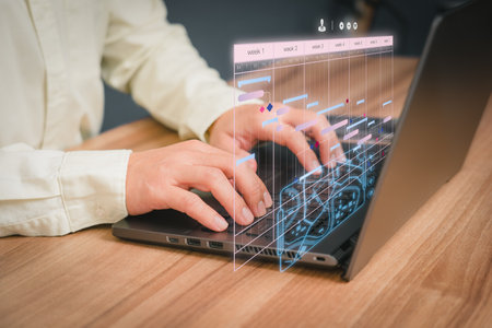 Man working with technology computer in Business Analytics and Data Management System to make report with KPI and metrics connected to database. Corporate strategy for operations, planing, marketing.の写真素材