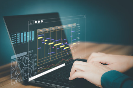 Man working with technology computer in Business Analytics and Data Management System to make report with KPI and metrics connected to database. Corporate strategy for operations, planing, marketing.の写真素材