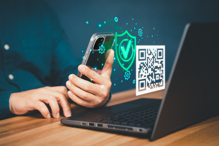 Concept of using smartphones to scan QR codes to make payment. Customer making payment through mobile phone and scan code for online shopping. Use of technology in the daily life of modern people.の写真素材