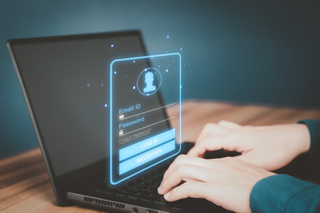 Man protecting personal data on a computer laptop and virtual interface. Cyber security concept to protect data. Secure encryption and access to the user's private information to access the internet.の写真素材
