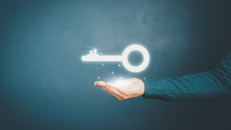 Businessman handing key icon in hand for concept of key to business success, solution, corporate development strategies for success, strategic planning and business processes.の写真素材