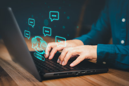 ChatGPT Chat with AI, Artificial Intelligence. Adult man chatting with a smart AI or artificial intelligence using an artificial intelligence chatbot developed, Futuristic technology transformation.の写真素材