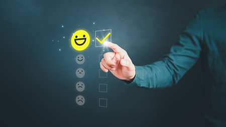 Man touching the virtual screen on the happy smiley face icon to give satisfaction in service. Rating very impressed. Assessment customer service, testimonial and satisfaction concept.の写真素材