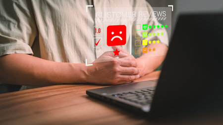 Unhappy man client with angry emotion face on virtual screen, Bad review, dislike service and quality, low rating, social media not good. Business service concept of customer experience dissatisfied.の写真素材