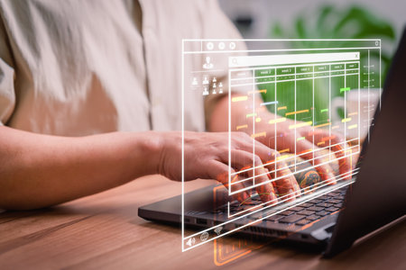 Man working data analytics with computer in business management system to make report with KPI and metrics connected to database. Corporate strategy for finance, operations, sales, marketing.の写真素材