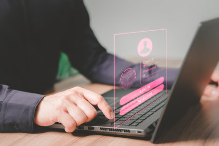 Man login with fingerprint scanning technology in the computer. Secure encryption and access to the user's private information to access the internet. Cyber security concept to protect data.の写真素材