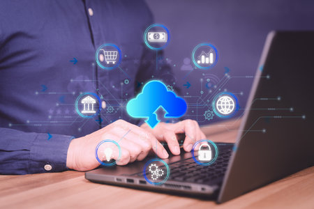 Businessman using laptop computer with cloud computing diagram. Business concept of cloud computing, Big Data Storage, Banking, Internet network security, Finance, Online Shopping, Digital link tech.の写真素材