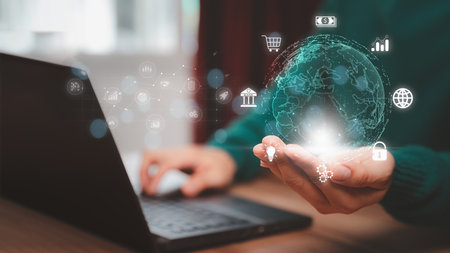 Man using a laptop computer to conduct various transactions via internet. Business global internet connection application and digital marketing, Financial and banking, link technology and big data.の写真素材
