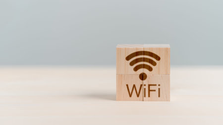 Wifi icon on wooden cube block for service in the cafe. Business communication social network with , Wireless network and connection technology concept.の写真素材