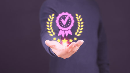 Man hand showing the best quality assurance with five stars. Assessment quality assurance of business services. Guarantee, warranty, standard, ISO certification, review, feedback, testimonial concept.の写真素材