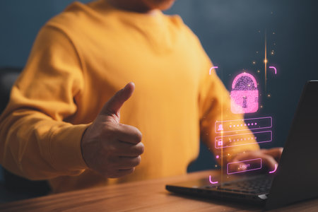 Adult man login or sign in with fingerprint scanning technology in the computer laptop. Secure encryption and access to the user's private information to access the internet.の写真素材