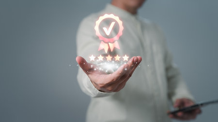 Assessment quality assurance of business services. Man hand showing the best quality assurance with five stars. Guarantee, warranty, standard, ISO certification, review, feedback, testimonial concept.の写真素材