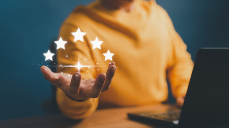 Client man hand showing the star icon to complete five stars. Assessment customer service giving the best rating, service feedback, satisfaction and testimonial concept.の写真素材