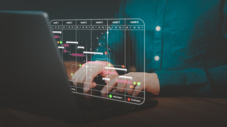 Business man working data analytics with computer in business management system to make report with KPI and metrics connected to database. Corporate strategy for finance, marketing, operations, sales.の写真素材