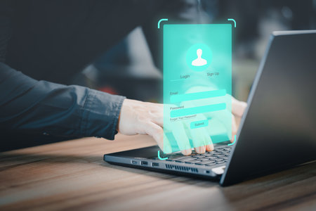 Adult Man type his user and password on a computer laptop. Cyber security concept to protect personal data. Secure encryption and access to the user's private information to access the internet.の写真素材