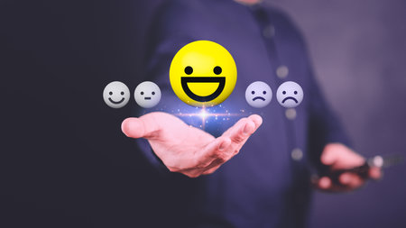 Client man hand showing happy smile face icon, good feedback rating, think positive, customer review, assessment, satisfaction, testimonial, good mental health, good mood. Opinion rating by shopper.の写真素材
