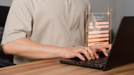 Adult Man type sign up for the website on a computer laptop. Cyber security concept to protect personal data. Secure encryption and access to the user's private information to access the internet.の写真素材