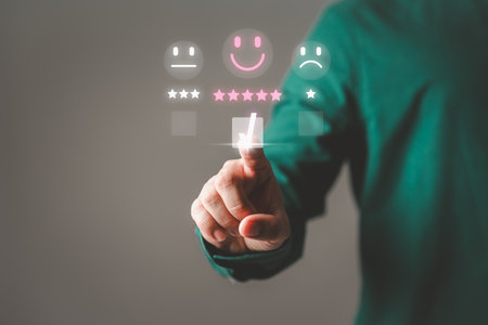 Man touching the virtual screen on the smile face icon and five stars to give satisfaction in service. Opinion rating very impressed. Assessment testimonial customer service and feedback concept.の写真素材