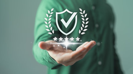 Hand showing the best quality guarantee with five stars. Testimonial, Assurance, Standards, ISO Certification, Review, Feedback and Certification Concept. Assessment quality of business service.の写真素材