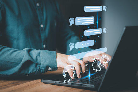 Chatbot Chat with AI, Artificial Intelligence. Adult man chatting with a smart AI or artificial intelligence using an artificial intelligence chatbot developed, Futuristic technology transformation.の写真素材