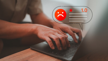 Testimonial from customer with angry emotion face on virtual screen, Bad social media review, dislike service and quality, low rating. Business service concept of customer experience dissatisfied.の写真素材