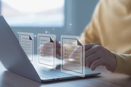Adult man using laptop computer with virtual screen contact questionnaire with checkbox. Document Management Checking System, online documentation database and process manage files. Technology DMS.の写真素材