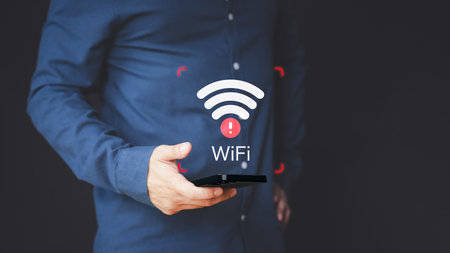 User using a mobile phone to connect to wifi but wifi not connected or password is incorrect and waiting to loading digital data form website, concept of waiting for connect to wifi by smartphone.の写真素材